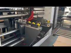 De golfmachine van de Kartondoos